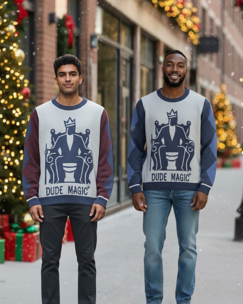 Two men wearing sweaters with 'Dude Magic' design in a festive outdoor setting.